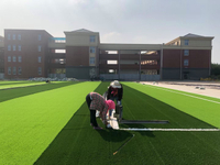 Césped sintético de relleno en forma de S para campo de fútbol sala