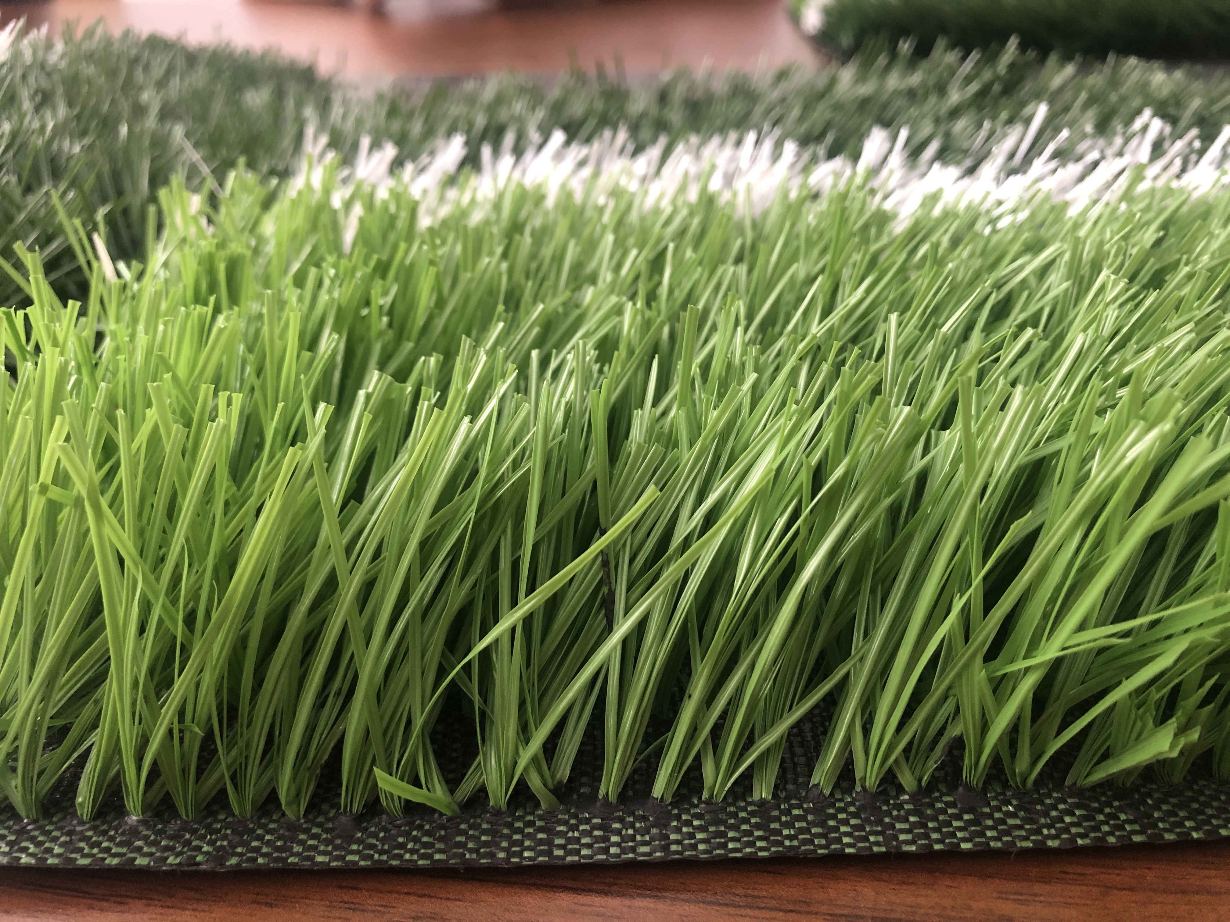 Césped sintético de relleno en forma de S para campo de fútbol sala